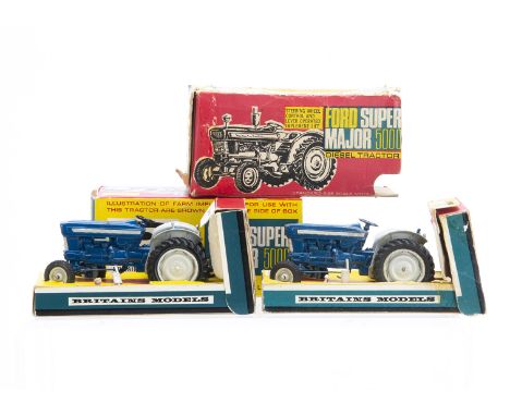 Britains boxed 9527 Ford Super Major 5000 Tractor (2), one model VG but beginnings of deterioration to rear hubs and separate
