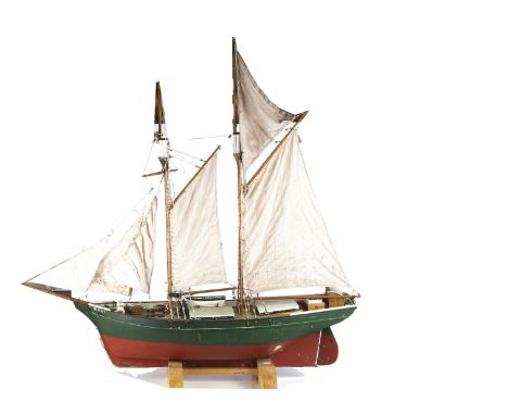 Large wooden Sailing Boat and smaller Sailing Barge, twin mast sailing cargo boat 'Mystery', Poole, red and green hull, varni