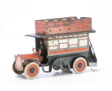 Orobr Germany tinplate clockwork Double Deck bus with open upper deck, in red and black with white windows, green driver and 