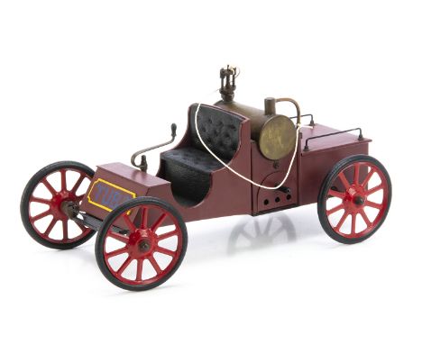 A Steam Turbine Veteran Car Model, two seated with steering handle, horizontal boiler behind seats with burner sliding in fro