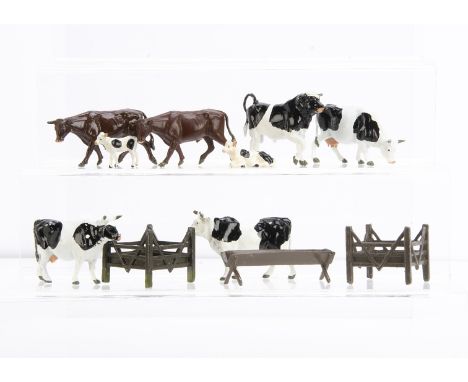 Britains farm cows and accessories comprising No.508 Cow Standing (7, inc 1 pre WW2 example),  509 Calf, 534 Calf lying (3), 