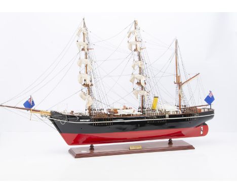 A modern static model of RRS 'Discovery', wood construction, black and red hull,  three masts with rolled sails and fully rig