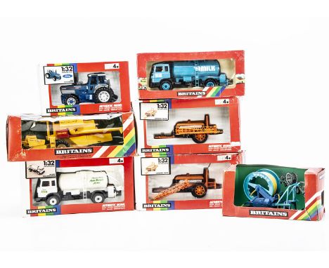Britains rainbow boxed tractors and implements comprising 9508 Ford TW25 Tractor,  9537 Superspray Tanker (2), 9547 Hose Drum