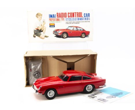 Imai (Japan) Radio Control 1:12 Aston Martin DB5, large scale model with red plastic body, black interior, chrome trim, grey 