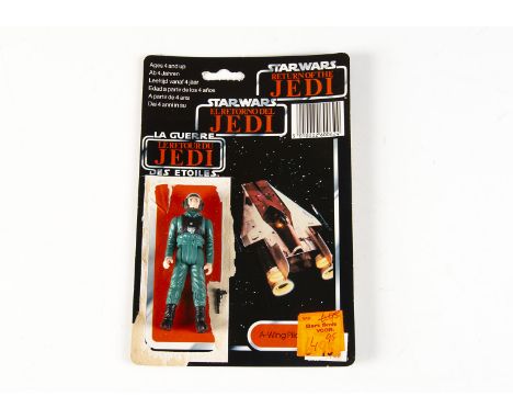 Vintage Star Wars Last 17 A-Wing Pilot Action Figure, with original black endor blaster and ROTJ tri-logo 70D cardback, Clipp
