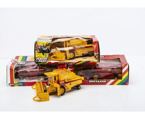 Britains Combine Harvesters comprising boxed Powerfarm item 9322 New Holland TR96, an unboxed example, and boxed 9570 Massey 
