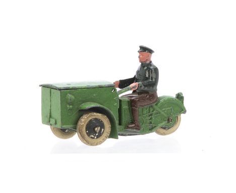 A Pre-War French Dinky Toys 14A Triporteur, green body, smooth silvered hubs, white 'Dunlop' tyres, hollow-cast driver with d