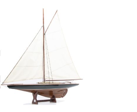 A very elegant wood construction static model 'pond' yacht, varnished hull with white band, clear varnished deck with a rolle