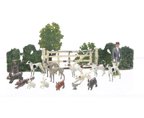 A small selection of lead Countryside animals and accessories including Britains Greyhounds (4), rabbits (2), hounds (2), and