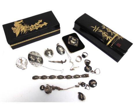 A COLLECTION OF SIAM NIELLO AND ENAMEL JEWELLERY  stamped Siam-Sterling; housed in two laquer boxes 