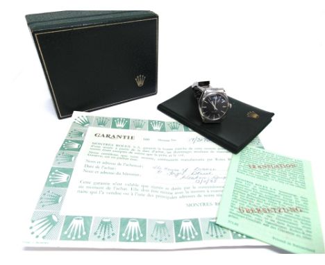 ROLEX OYSTER PERPETUAL, AIR KING a gentleman's stainless steel wristwatch, on a bracelet, the black dial with steel batons, l