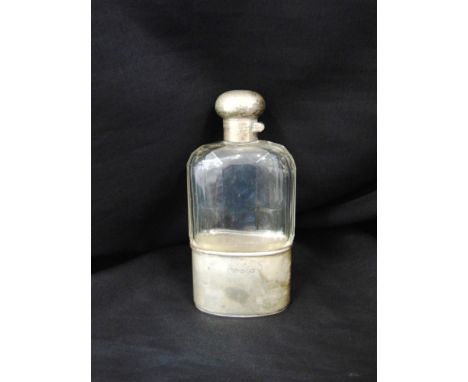 A SILVER MOUNTED GLASS HIP FLASK  by J.C. Vickery, London 1900, pull off monogrammed cup base, bayonet captive top, 69g (2.2 