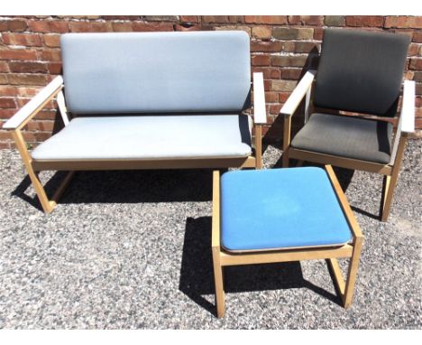 A FINNISH DESIGN TWO SEATER SOFA, CHAIR AND FOOTSTOOL  with beech and bent plywood frames, the sofa 122cm wide