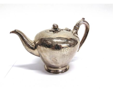 A VICTORIAN SILVER TEAPOT  by Richard Pearce & George Burrows, London 1843, of tapering compressed round shape, engraved foli