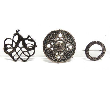 DAVID - ANDERSON, A SILVER COPY OF A VIKING JEWEL IN THE FORM OF A BROOCH a Robert Allison circular brooch; and a Celtic silv