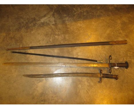 Swagger Stick, Bayonet, Sword and a Scabbard