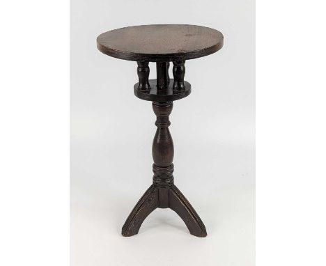 An oak lace maker's candle stand, 19th century, having a birdcage support and tripod base, h.43cm, dia