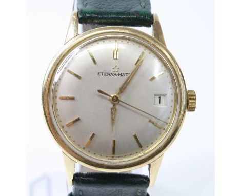 A yellow metal Eternamatic manual wind wristwatch, having round silver baton dial, sweeping second hand and date at 3, fitted