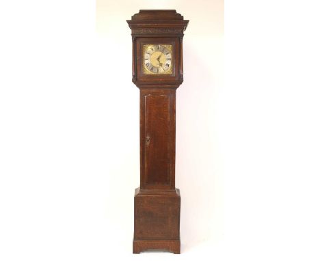 Jonas Barber of Winster - a George III oak longcase clock, the hood with a caddy top and blind carved frieze, above a 10¼" sq