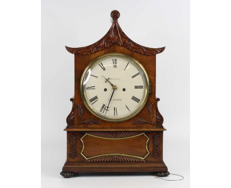 Schwerer of Falmouth - a late Regency mahogany cased bracket clock, having a signed white enamel convex Roman dial, twin wind