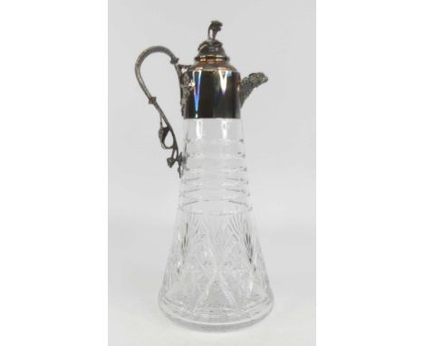 An Elizabeth II silver topped and cut glass claret jug, the tapered body having faceted banded and diamond cut decoration to 