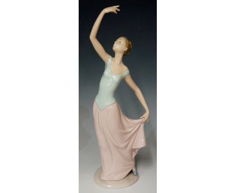 A Nao figure of a dancer, base marked Nao, hand painted in Spain by Lladro Daisa, 34.5cm high