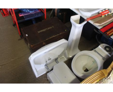 A Lefroy Brooks pedestal hand basin with two taps and plug