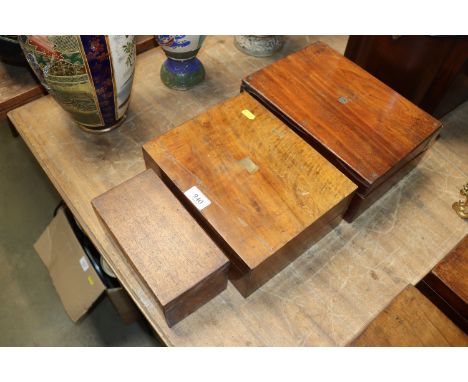 A brass inlaid writing slope, a mahogany tea caddy lacking interior and a writing box lacking interior