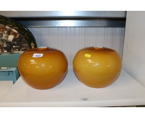 Two coloured glass light shades