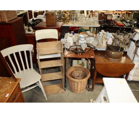An oak tea trolley, a copper coal scuttle, wicker basket, pine open fronted bookcase, slat back dining chair, bar stool, a li