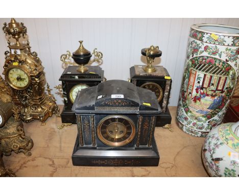 Three late Victorian black slate mantel clocks