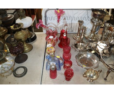 A collection of cranberry glassware to include Mary Gregory style flower basket, an epergne, blue glass flask etc.