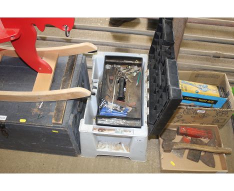 A plastic tool box with contents of tools