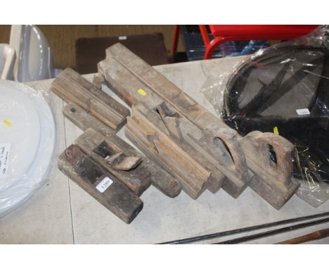 A quantity of vintage wood planes AF
