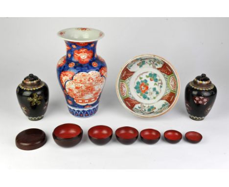 A Japanese Imari vase, Meiji Period; together with a polychrome enamel bowl; a pair of Japanese cloisonne enamel vases and a 