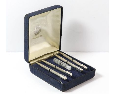 Cased set of four silver and enamel bridge pencils with spare leads by Ari Norman, Birmingham 2001.