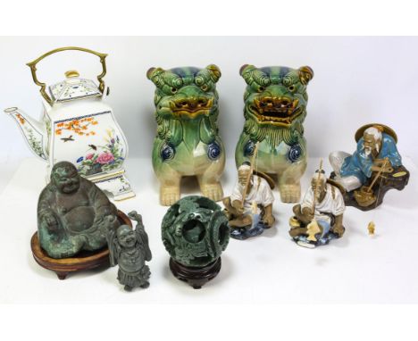 A pair of ceramic Buddhist Lions; a small Canton famille rose teapot; a Japanese ningyo of a standing Yamato Nadeshko; a spin