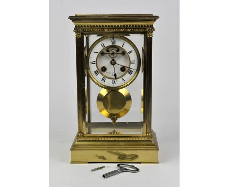 Brass mantel clock by Marshall and Sons, Paris, with an architectural case, the enamel dial with Roman numeral and exposed es