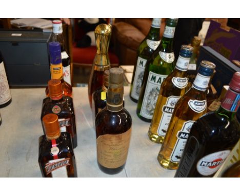 A bottle of Canadian Club Whisky, Dewars Ancestor Old Scotch Whisky; and Beams Pin Bottle Bourbon Whisky
