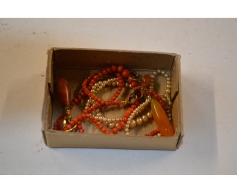 A coral bead necklace; together with two amber coloured drop ear-rings; and a pearl necklace with gold clasp 