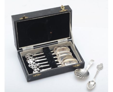 A George III silver shell bowl caddy spoon, London 1798, a silver George VI coronation spoon, London 1936 and a set of EPNS c