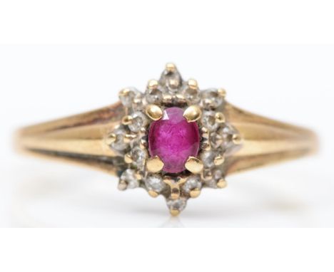 A 9ct gold ruby and diamond cluster ring, Q, 2.1gm 