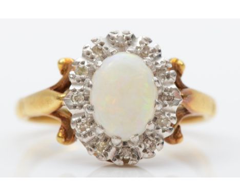 A vintage 18ct gold opal and diamond cluster ring, K 1/2, 4.1gm 