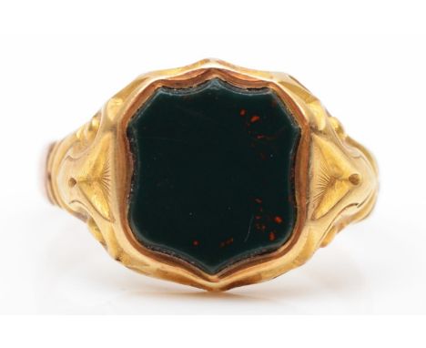 A Victorian gold and bloodstone signet ring, the head tests 15ct, the shank 9ct,R, 5.2gm 