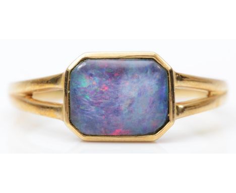 A 9ct gold and black opal triplet dress ring, 9 x 7mm,O, 2gm 