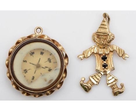 A 9ct gold articulated clown pendant and a vintage 9ct gold compass charm, 3.7gm