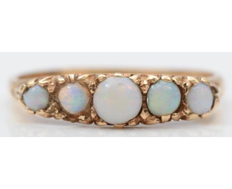 A vintage 9ct rose gold five stone opal ring, carved claw set, V, 3gm 