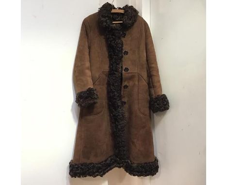An Antartex Loch Lomond lady's vintage full length sheepskin coat in deep chocolate brown with sheepskin trimmed collar, cuff