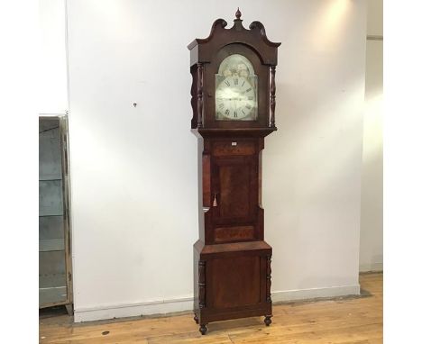 A mid 19thc. moon face longcase clock by Samuel Kellett of Bredbury, the arched painted dial with subsidiary seconds and date