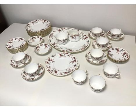 A Minton Ancestral pattern teaset including nine cups and saucers, eight small plates, nine larger plates, two small bowls, a